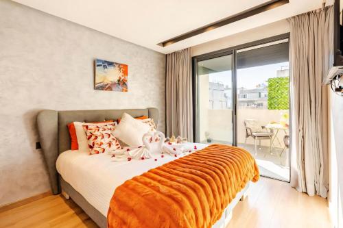 Katil atau katil-katil dalam bilik di Studio Cosy, corniche à 2 min , Parking , Netflix