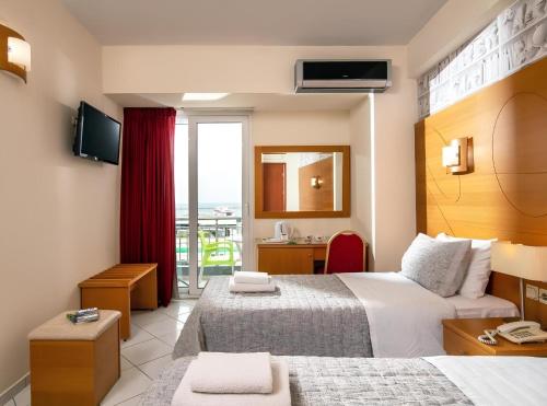 Posteľ alebo postele v izbe v ubytovaní City Life Hotel
