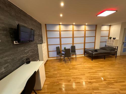 Μια τηλεόραση ή/και κέντρο ψυχαγωγίας στο Apartament am Dom