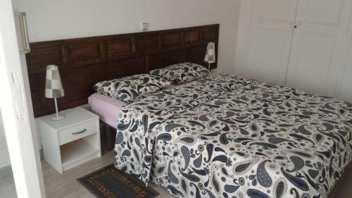 Ένα ή περισσότερα κρεβάτια σε δωμάτιο στο Tenerife Sur