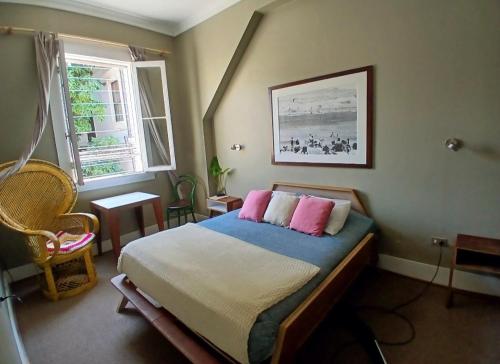 Postel nebo postele na pokoji v ubytování El Navegante B&B