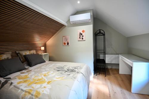 Ένα ή περισσότερα κρεβάτια σε δωμάτιο στο Viticolo Chambres d'hôtes
