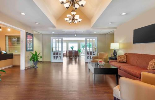 a large living room with a couch and a tv at Extended Stay America Suites - Philadelphia - Malvern - Swedesford Rd in Malvern