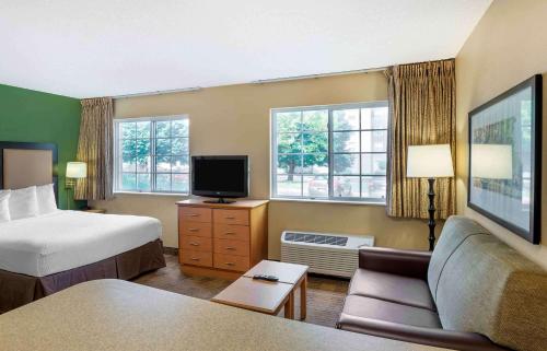 a hotel room with a bed and a tv at Extended Stay America Suites - Philadelphia - Malvern - Swedesford Rd in Malvern
