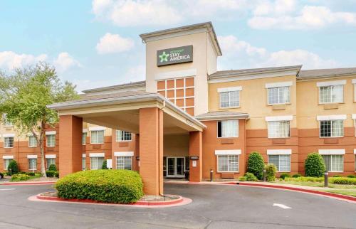 a rendering of a hotel with a parking lot at Extended Stay America Suites - Memphis - Germantown in Memphis