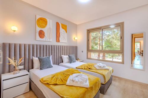 Ένα ή περισσότερα κρεβάτια σε δωμάτιο στο Alma Prestigia Appartments