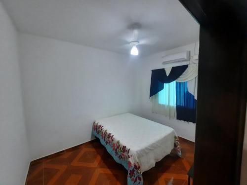 Postel nebo postele na pokoji v ubytování Casa da Dona Neide