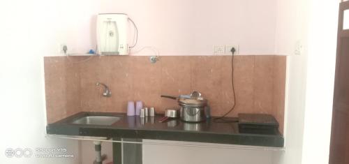 Kuchyň nebo kuchyňský kout v ubytování Richnest Apartment Colva Beach
