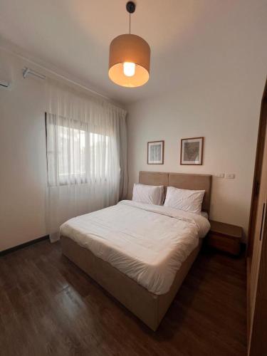 Ένα ή περισσότερα κρεβάτια σε δωμάτιο στο Privado by Manazil, 6A,Luxury Open View Stay in Privado!