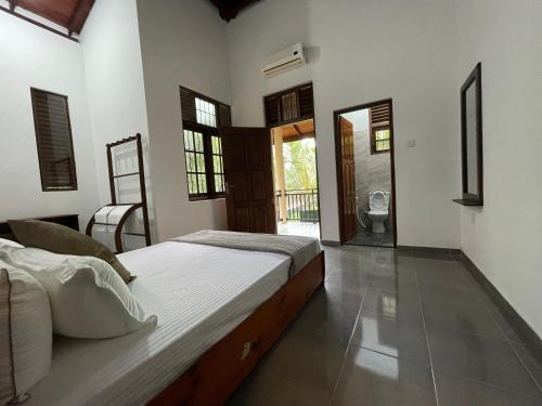 Ένα ή περισσότερα κρεβάτια σε δωμάτιο στο Peacock Paradise