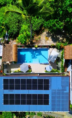 an overhead view of a blue swimming pool with at Casa Basa Siargao in General Luna