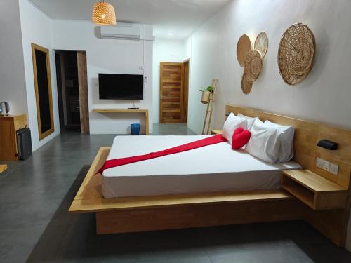 Ένα ή περισσότερα κρεβάτια σε δωμάτιο στο Villas Rocher Suite 3 C