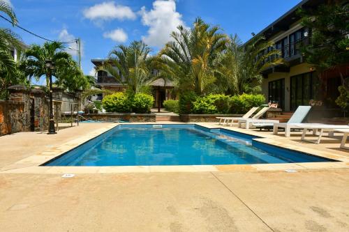 Πισίνα στο ή κοντά στο Villas Rocher Suite 3 C