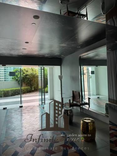 Posezení v ubytování Infinite Space at Acqua Private Residences - Iguazu Tower