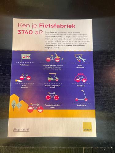 a sign for a pair of glasses on a table at Broekemmolen - Nature getaway & green spot in Bilzen