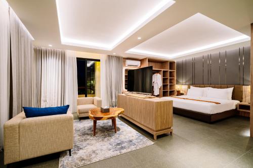 Ένα ή περισσότερα κρεβάτια σε δωμάτιο στο Big Dragon Villas Ubud