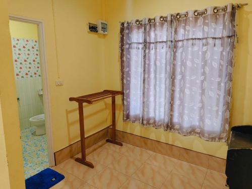 Postel nebo postele na pokoji v ubytování Pooma Resort