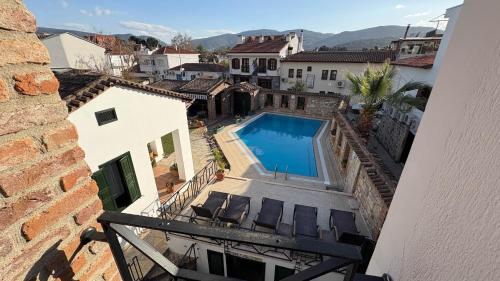 a view of a swimming pool from a building at Akay Hotel in Selcuk