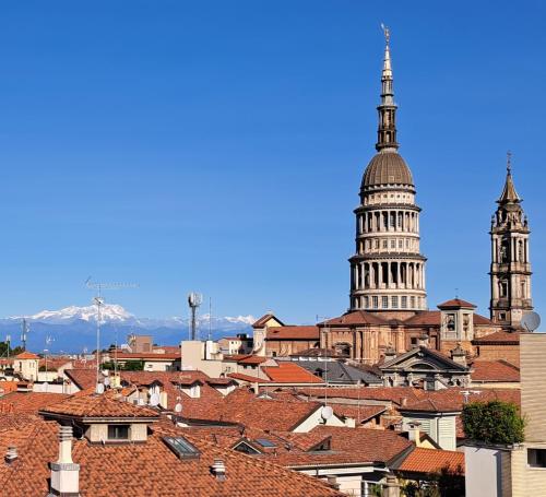 a view of the capitol building and roofs of a city at Suite Panoramica in Novara