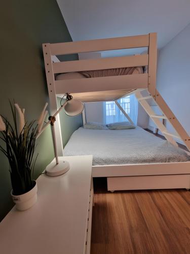 Ένα ή περισσότερα κρεβάτια σε δωμάτιο στο Appartement 4P 85m² hyper centre Disney