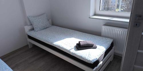 Postel nebo postele na pokoji v ubytování 7 Apartament Częstochowa