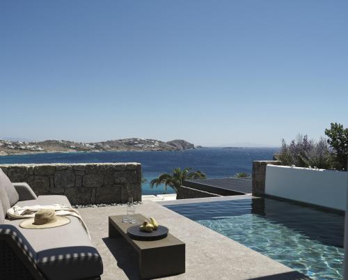 a villa with a view of the ocean at Noima Boutique Hotel Mykonos in Agios Ioannis Mykonos