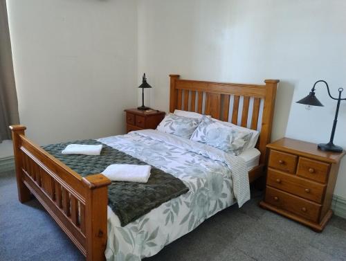 Katil atau katil-katil dalam bilik di Corella Accommodation 1B