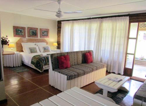 Ένα ή περισσότερα κρεβάτια σε δωμάτιο στο Dlinza Forest Accommodation