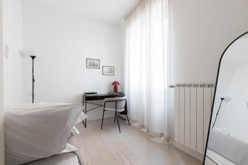 Postel nebo postele na pokoji v ubytování Elegant Flat in Ponte Milvio