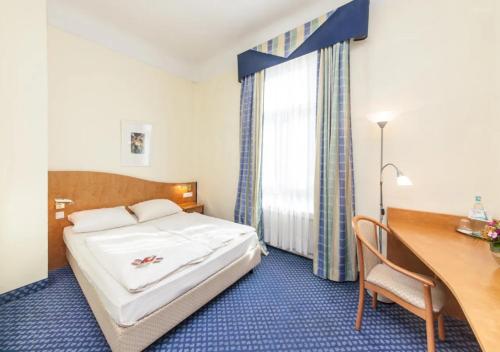 Hotel Viktoria Düsseldorf-Neuss - Self Check-Inにあるベッド