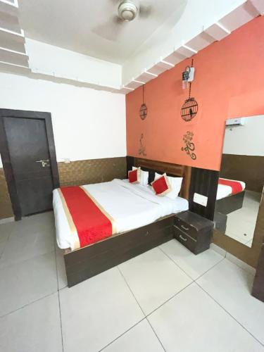 a hotel room with a bed and a sink at Royal Taj view in Agra