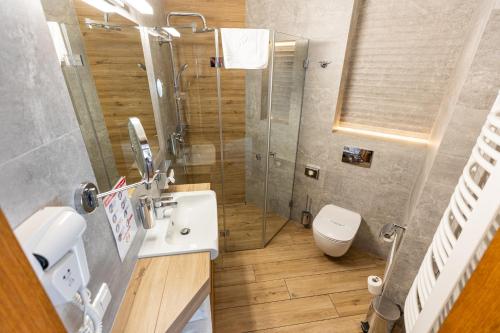 Koupelna v ubytování K4 APARTHOTEL KRAKÓW
