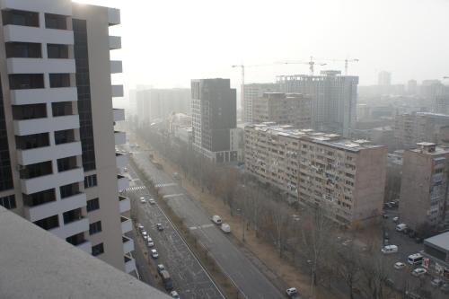 an aerial view of a city street with buildings at G Suite in Yerevan