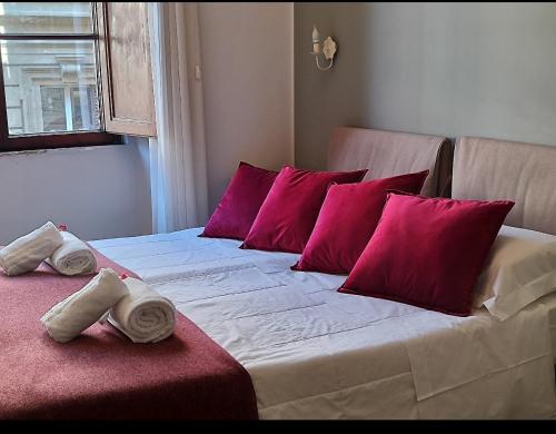 En eller flere senge i et værelse på B&B Dimora Sassetti 6