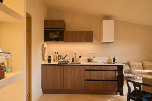a kitchen with a sink and a counter at Logement atypique de 45m2, en centre ville de Cognac in Cognac