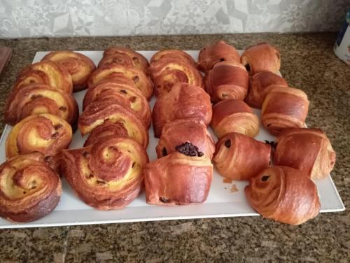 a tray of pastries sitting on a table at BB Il benvenuto in Loreto
