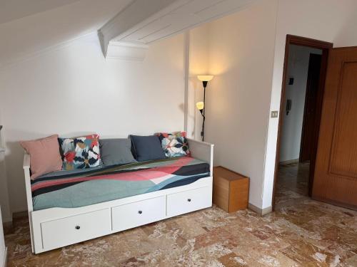 Ένα ή περισσότερα κρεβάτια σε δωμάτιο στο Casa Vacanze Terramare
