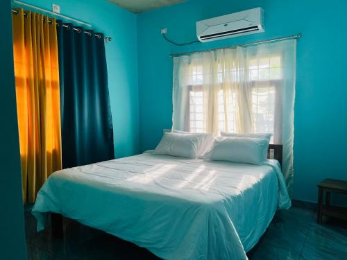 Cama o camas de una habitación en Akazumba home stay