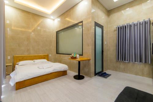 Ένα ή περισσότερα κρεβάτια σε δωμάτιο στο Homestay Cô Hai