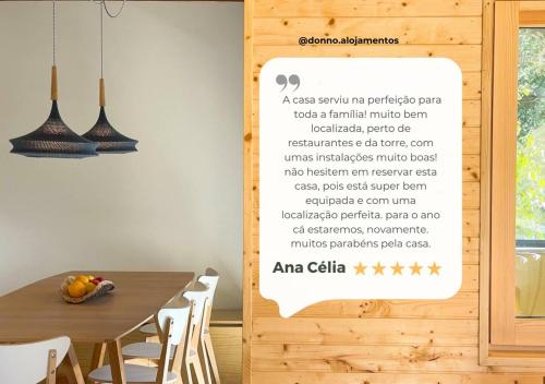 a sign in a dining room with a table and chairs at Chalet Serra 1506 Geopark S Estrela in Penhas da Saúde