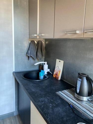 Kuchyň nebo kuchyňský kout v ubytování KVETa