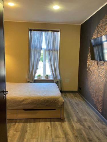 Postel nebo postele na pokoji v ubytování KVETa