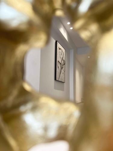 a blurry picture of a painting on a wall at ZISE Luxury Apartments in Corfu