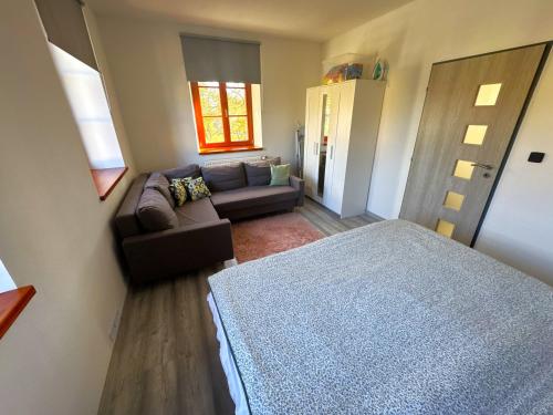 Ένα ή περισσότερα κρεβάτια σε δωμάτιο στο Apartmán Špálovka