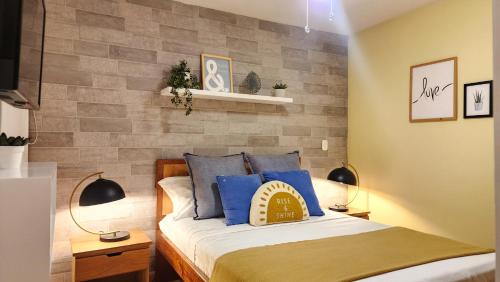 Кровать или кровати в номере Apartasol Vacacional - La ReservaTravel - Eje Cafetero