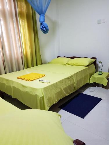 Bopitiya Residence 20 Mins from Airportにあるベッド