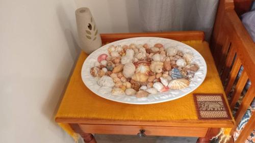 a plate of different types of rocks on a table at Armadale Country Retreat in Gqeberha