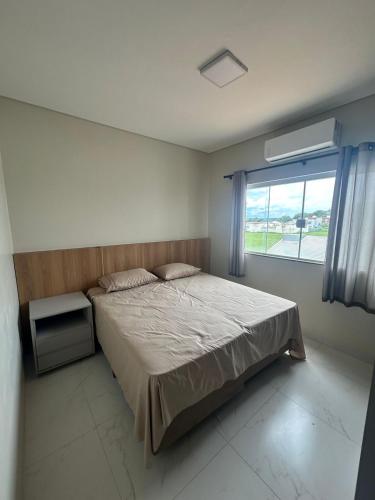 Ένα ή περισσότερα κρεβάτια σε δωμάτιο στο Seamaid residencial