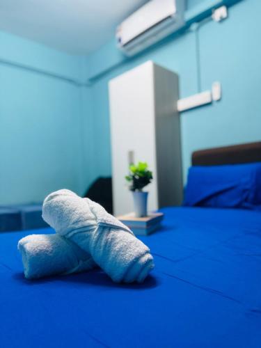 Postel nebo postele na pokoji v ubytování 1br 3pax near usm Netflix Malaysian guest only