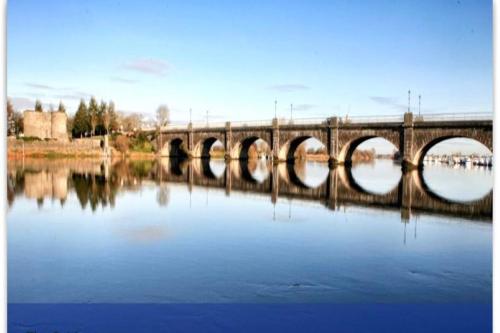 a bridge over a large body of water at GlebeH Self Catering in Banagher